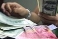 Rupiah berakhir stagnan...