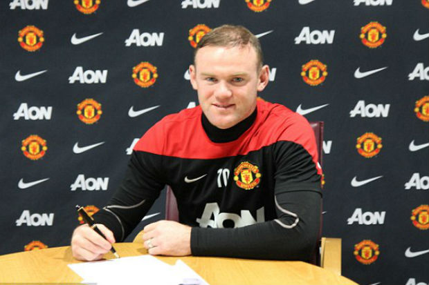 Rooney senang bertahan...