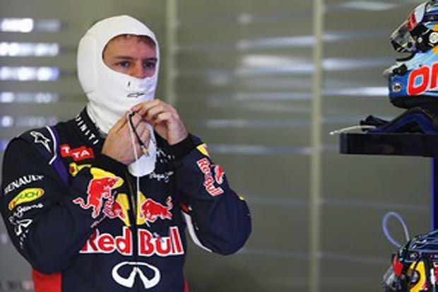 Vettel Iri Dengan Mobil...
