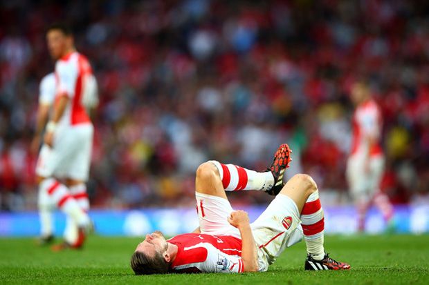 Ramsey Menepi Enam Pekan