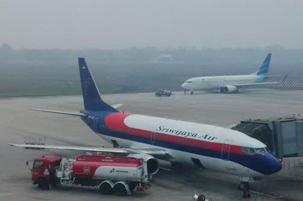 Kabut Asap Ganggu Penerbangan...