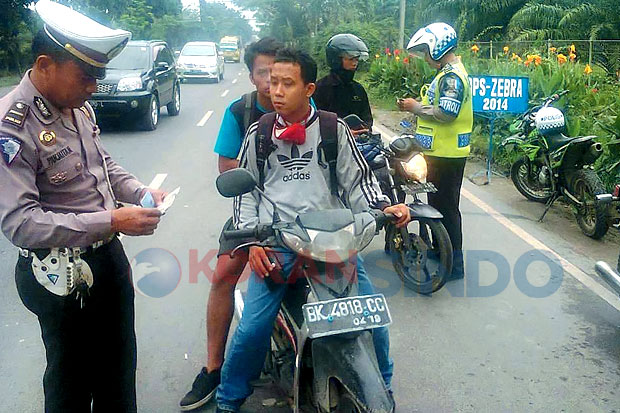 Pengendara Sepeda Motor...