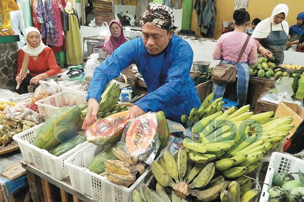 Pedagang Pasar Ikut...