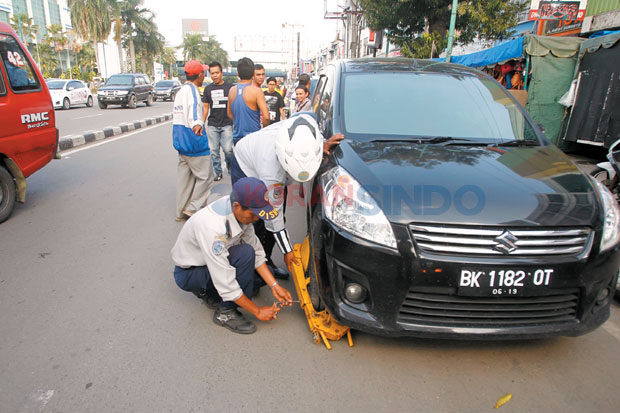 Setoran Pengawas Parkir...