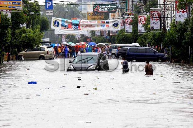 Kerugian Akibat Banjir...