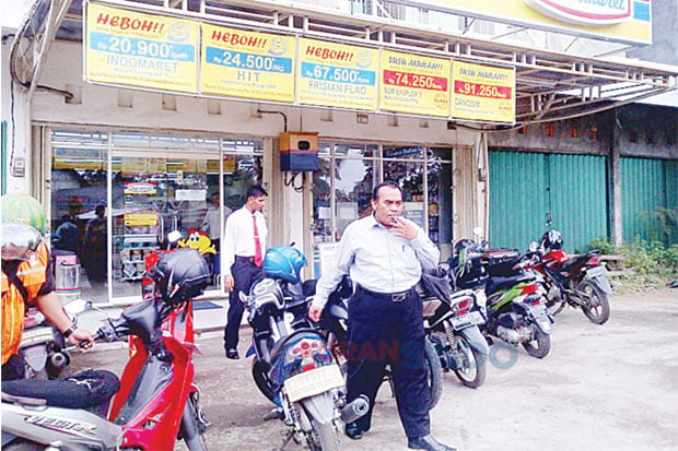 Todongkan Senpi di Indomaret