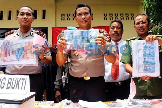Uang Rp50.000 Dipalsukan...
