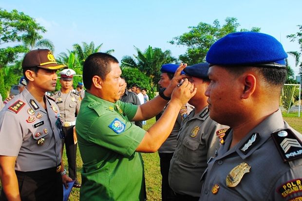 9 Polisi di Sergai Positif...