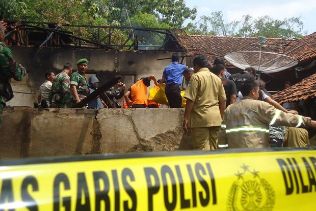 Dua Rumah Terbakar,...