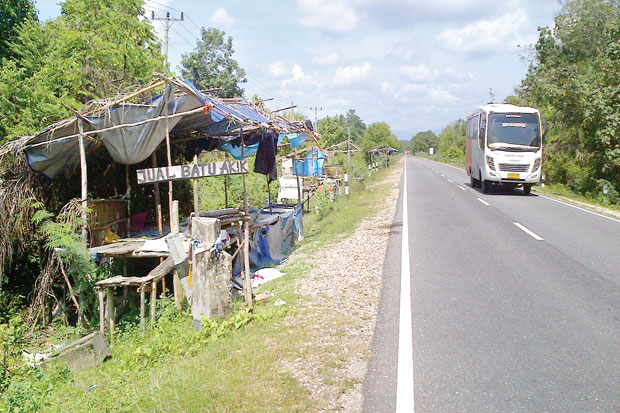 Penjual Batu Akik Gulung...