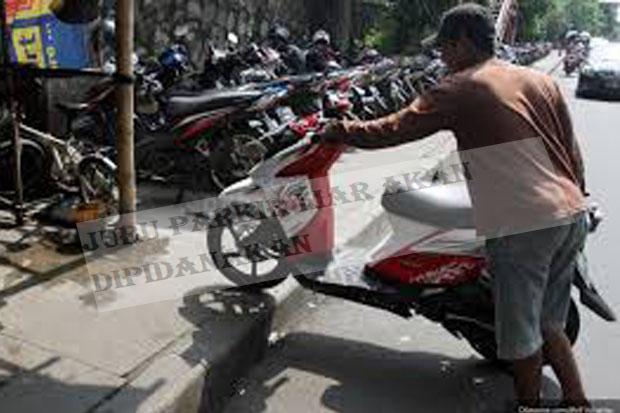 Juru Parkir Liar Akan...