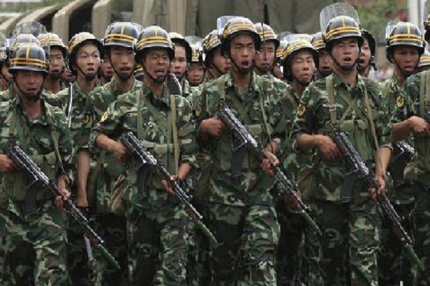 China Bantah Kirim Pasukan...