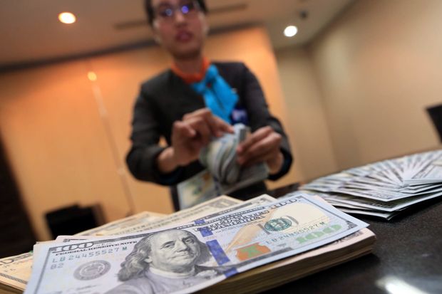 USD Stabil terhadap...