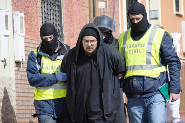 Spain Arrested Recruiting...