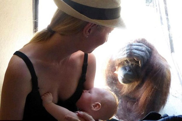 Breastfeeding Her Son...