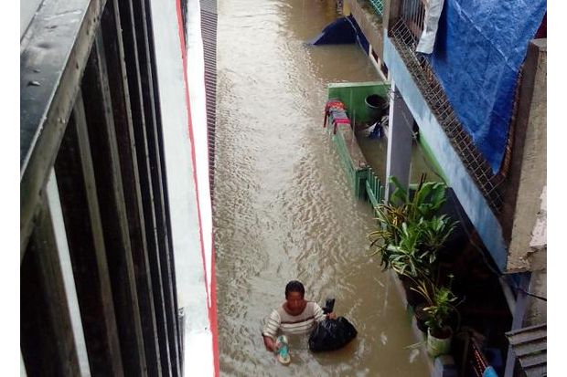 Diguyur Hujan Deras,...