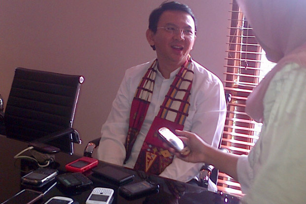 Ahok Klaim Titik Genangan...