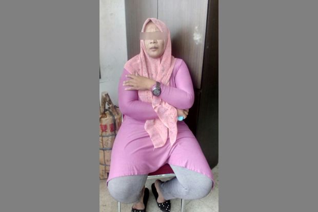 Wanita Ini Sembunyikan...