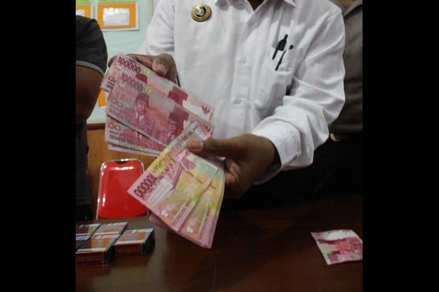 Edarkan Uang Palsu,...
