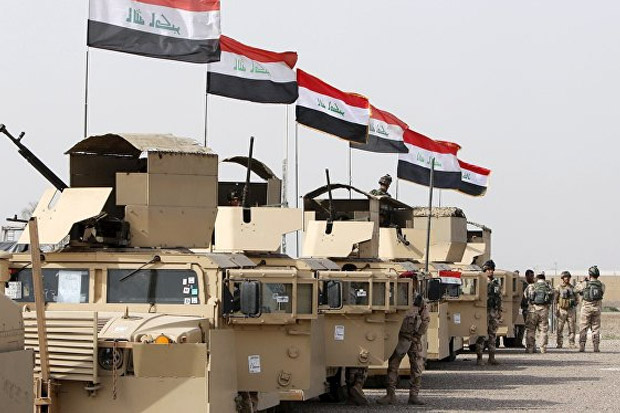 Pasukan Irak Rebut Gedung...