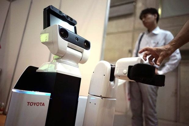 Toyota Kembangkan Robot...