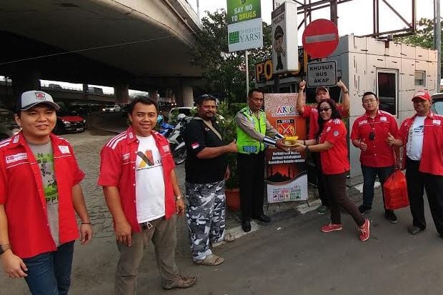 Aksi Sosial AXIC Saat...