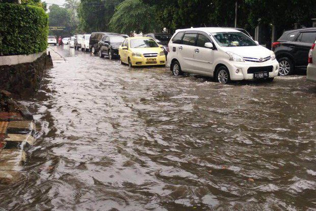 Diguyur Hujan Deras,...