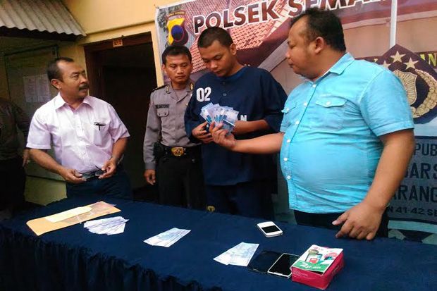 Beli Uang Palsu Lewat...