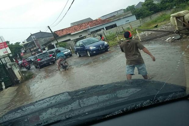 Jalan Belum Diperbaiki,...