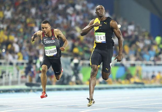 Usain Bolt Pertahankan...