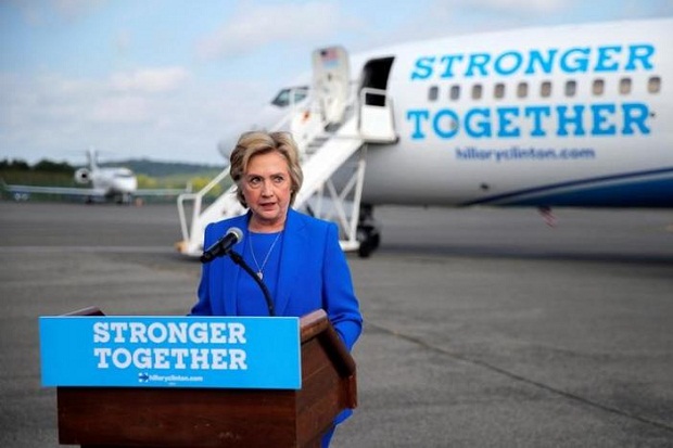 Hillary: Puji Putin,...