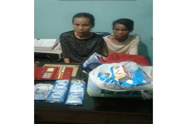Nyopet di Pusat Perbelanjaan,...