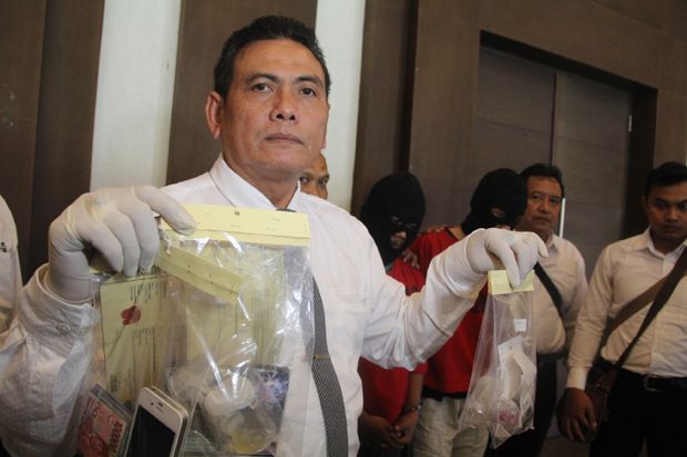 Dua Pengedar Tembakau...