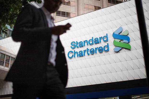 Standard Chartered Dorong...