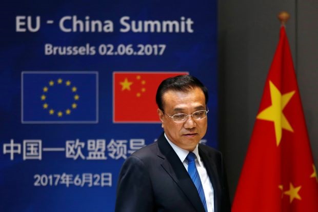 China Komitmen Menentang...