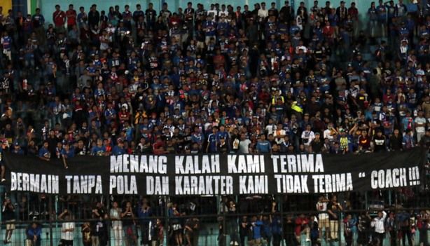 Aremania Desak Aji Santoso...