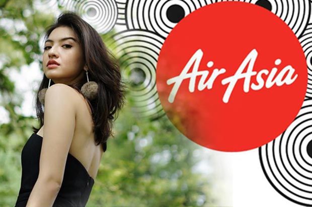 Jabat Komisaris AirAsia,...
