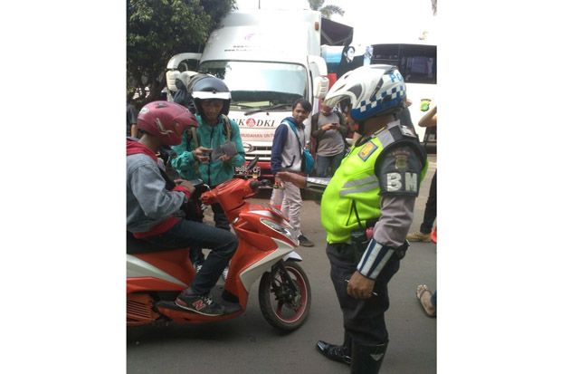 Razia Pajak Kendaraan,...