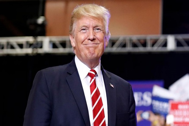 Trump Ancam Bubarkan...