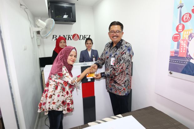 Bank DKI Kembali Membuka...