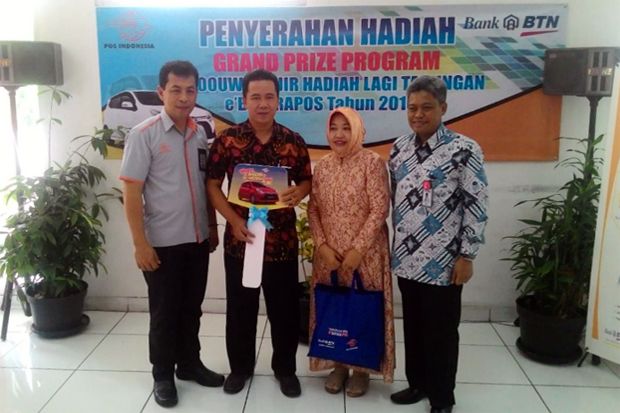 PT Pos Indonesia dan...