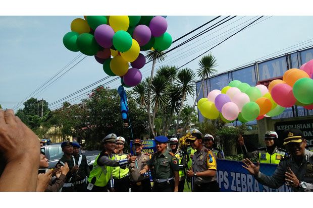 Patuh Berlalu Lintas,...