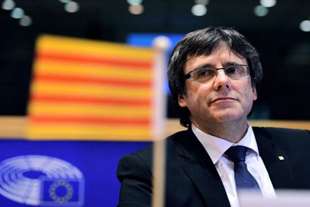 Spain Issues Warrant...