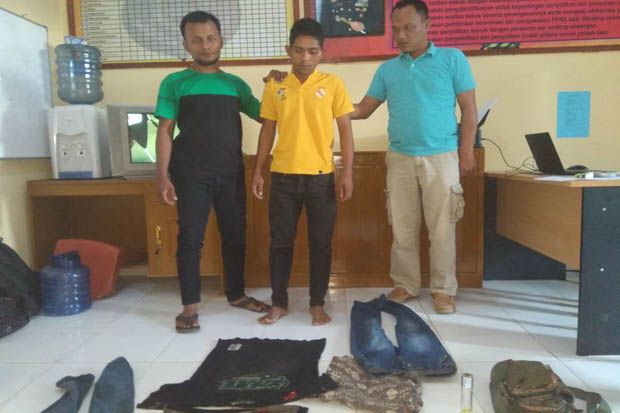 Seorang Pemuda Ditangkap,...