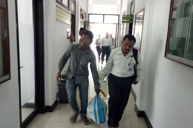 Tersangka Perusak Situs...