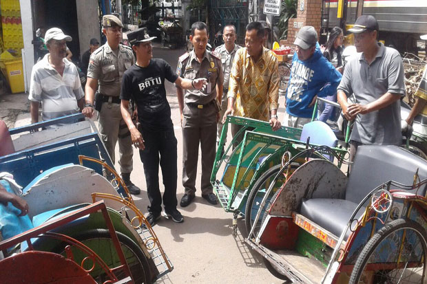 Tukang Becak Pendatang...