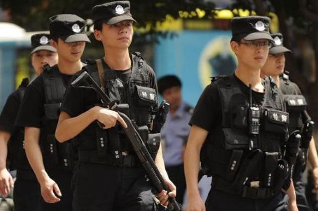 Polisi China Tangkap...