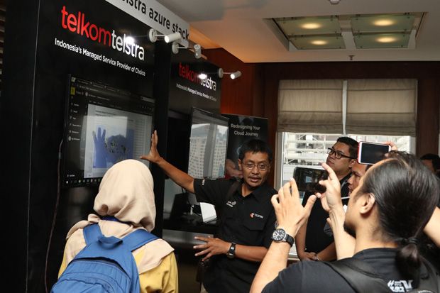 Telkomtelstra Dorong...