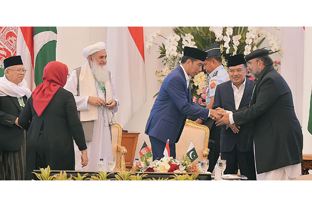 Indonesia Bantu Damaikan...