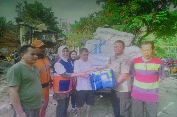 Dinsos Berikan Bantuan...